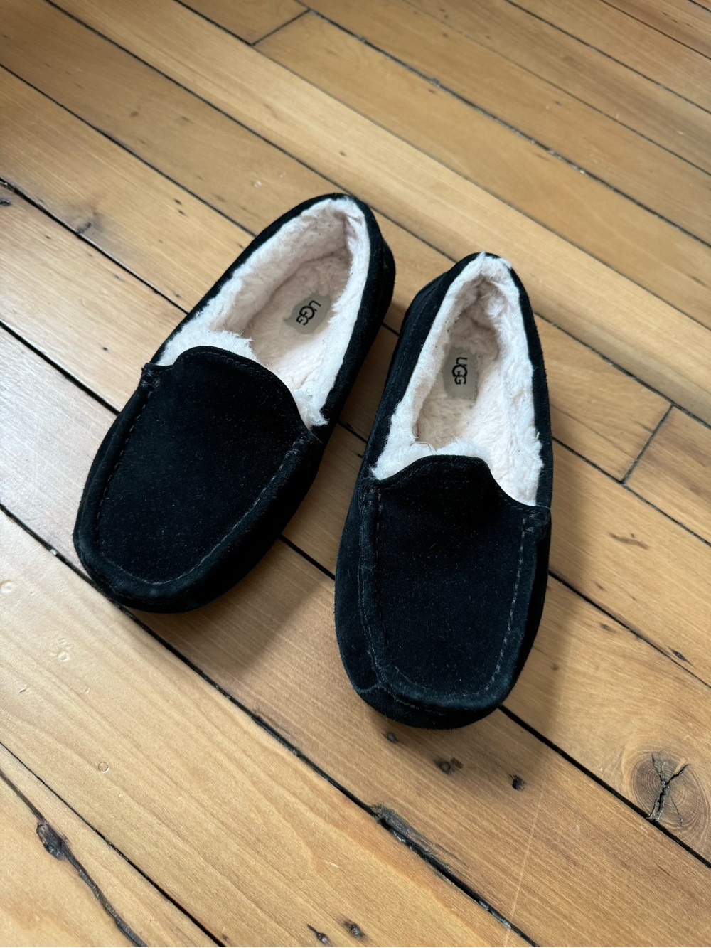 UGG Kids Black Suede Moccasin Slippers with Cream Shearling Lining